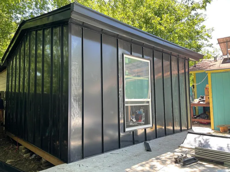 Black standing seam metal wall panels for Metal Roof Installation in Palm Bay